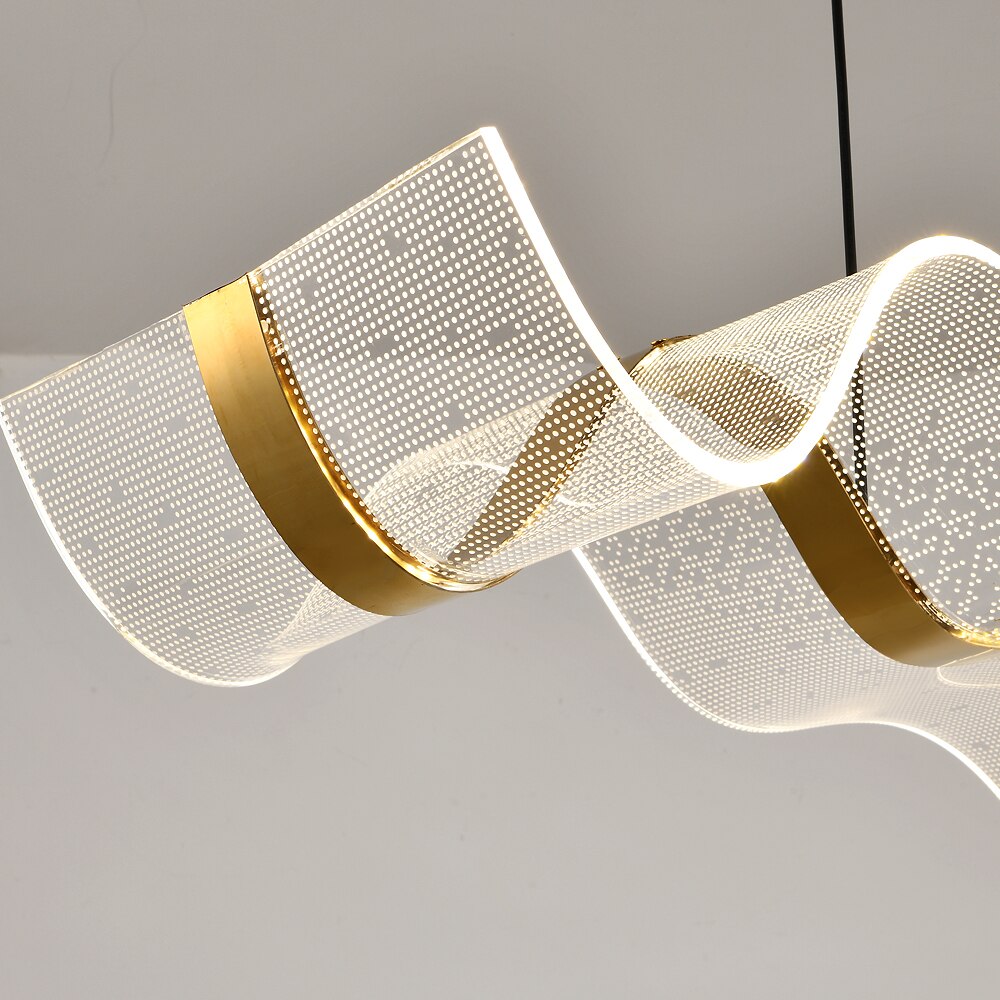 Detailed shot of the Capitano chandelier’s sculptural wave design with fine mesh texture and soft ambient LED glow.