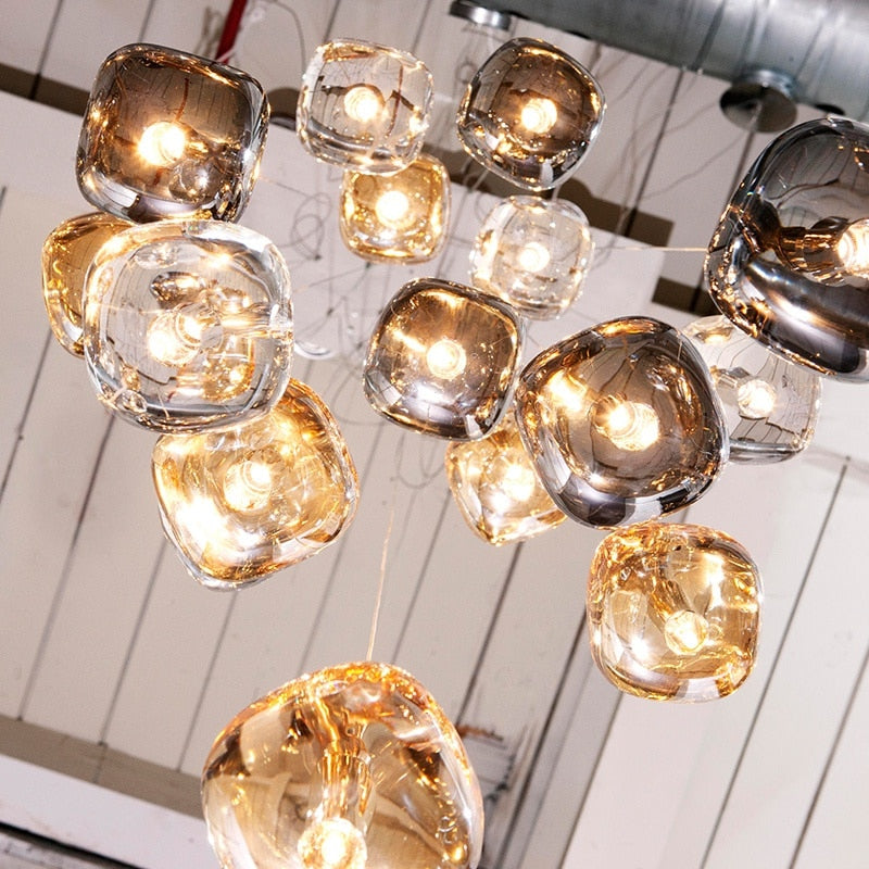 Contemporary multi pendant staircase chandelier creating elegant vertical lighting feature by VORELLI®