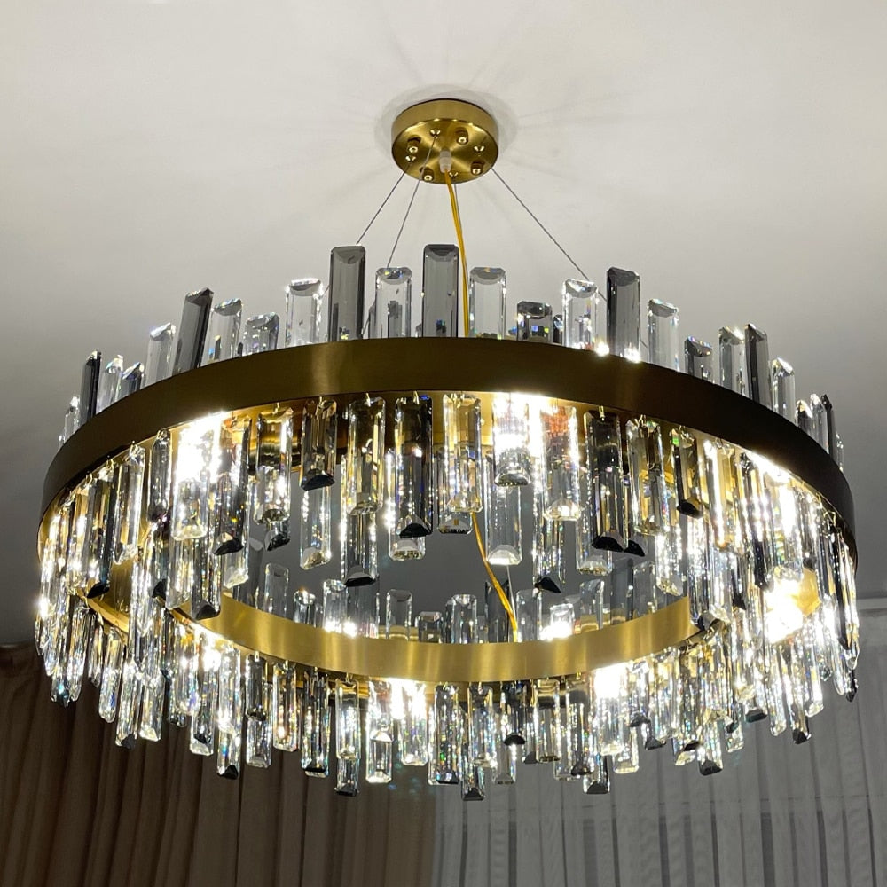 Circular chandelier with stainless steel frame and diamond cut crystals