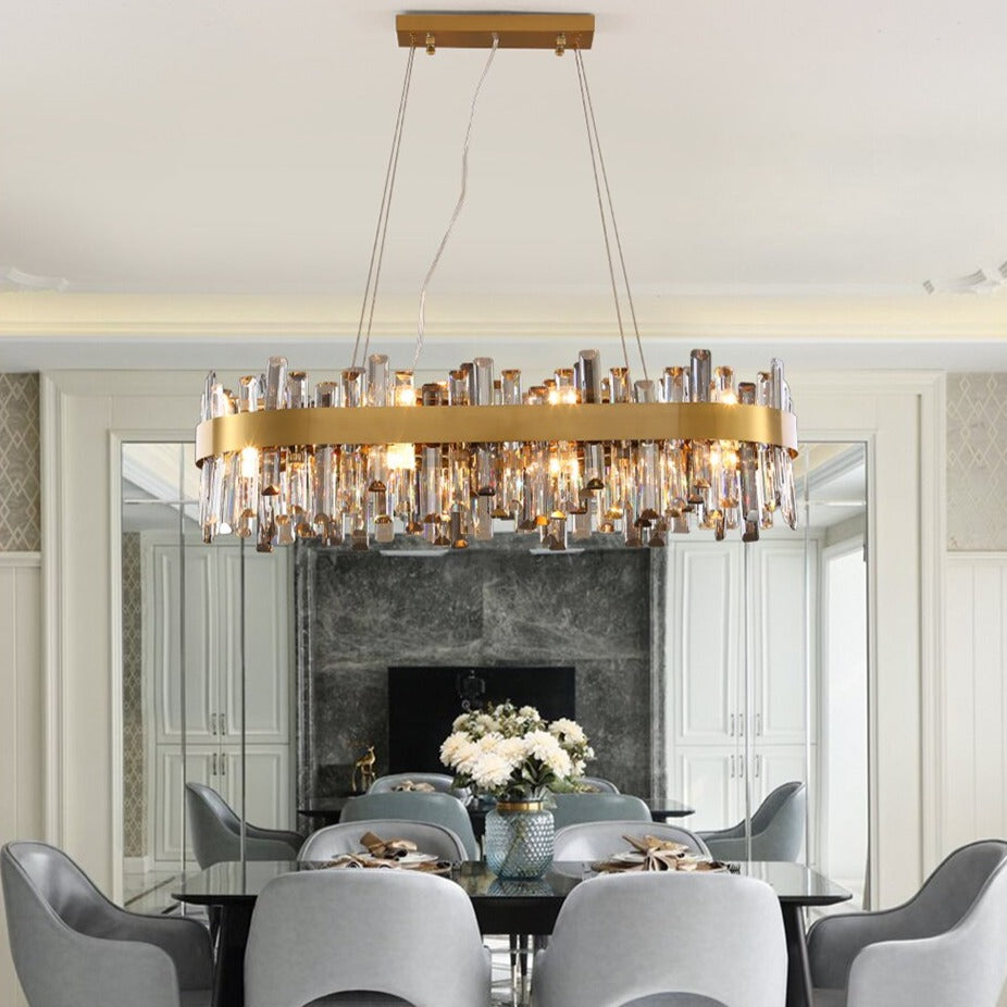 Figueroa rectangular chandelier with diamond cut crystals over dining table