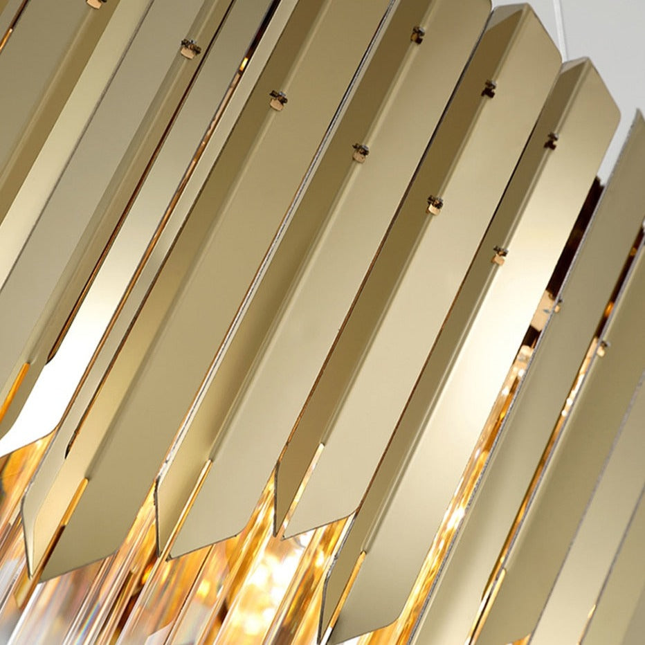 Close-up of the VORELLI Manhattan Rectangular Chandelier gold decorative frame and vertical crystal bars