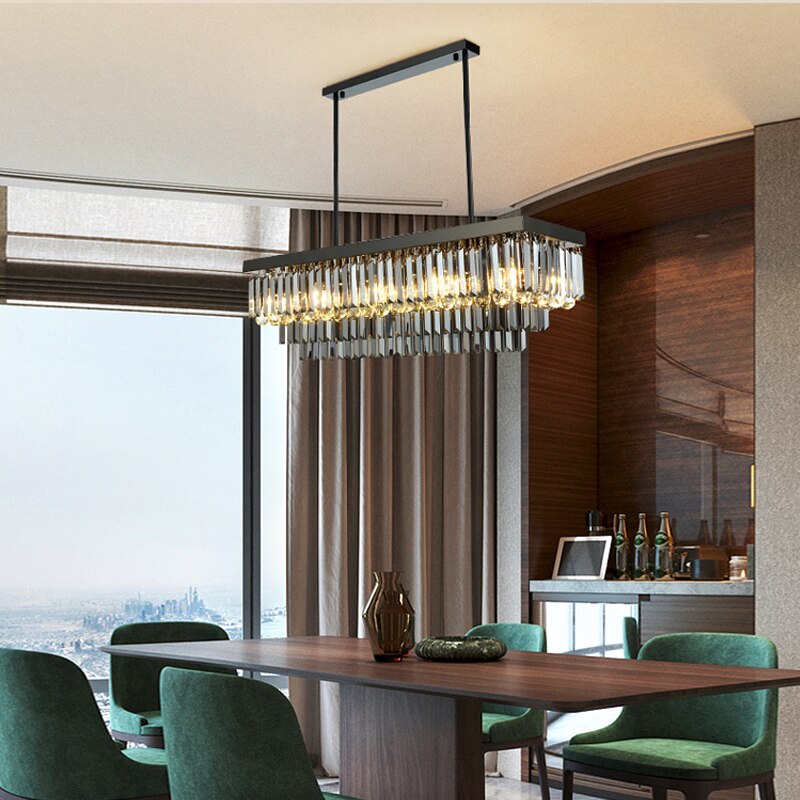 VORELLI Margoux crystal rectangular chandelier illuminating an elegant dining room with warm sophisticated glow and contemporary design