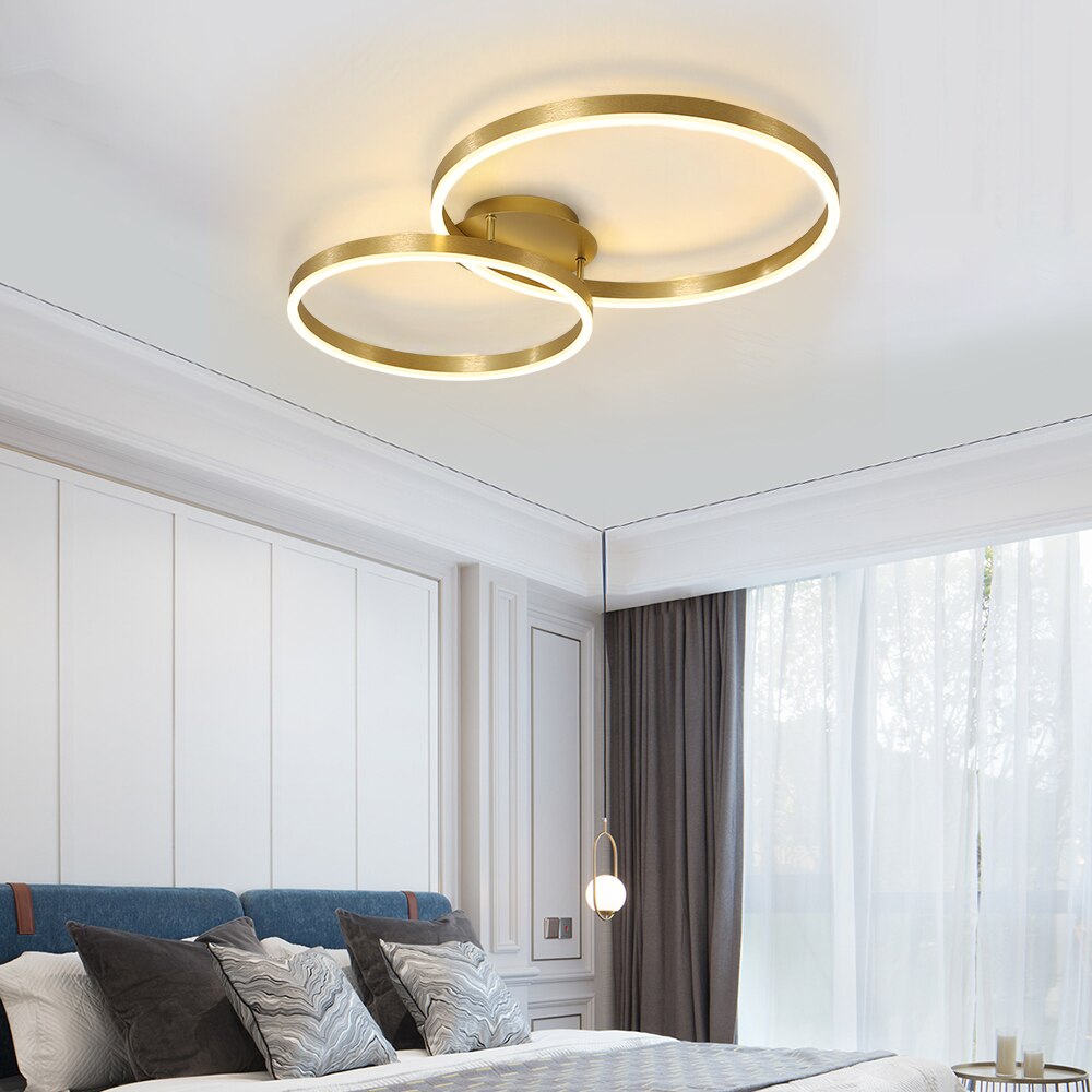 VORELLI Maumelle ceiling light featuring minimalist LED ring design in a modern luxury bedroom interior with soft ambient illumination