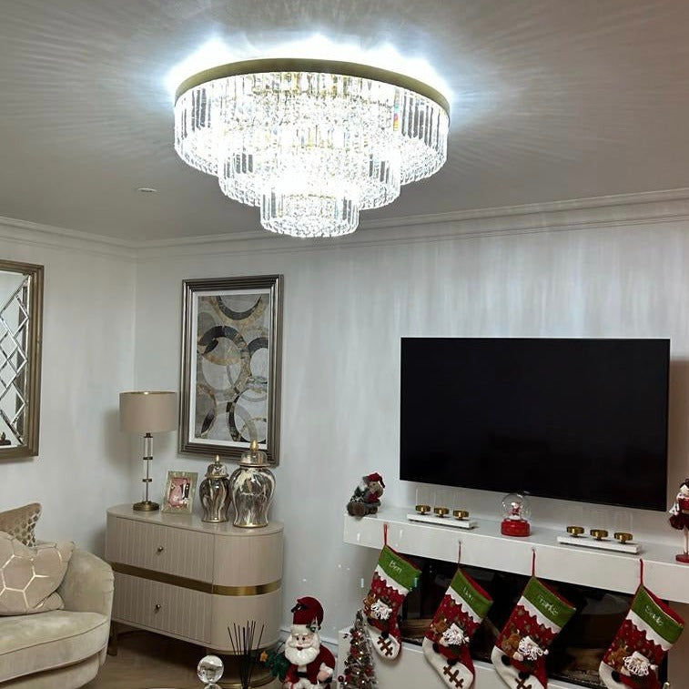 VORELLI Merlimont tiered crystal ceiling light creating radiant ambient lighting in a contemporary room