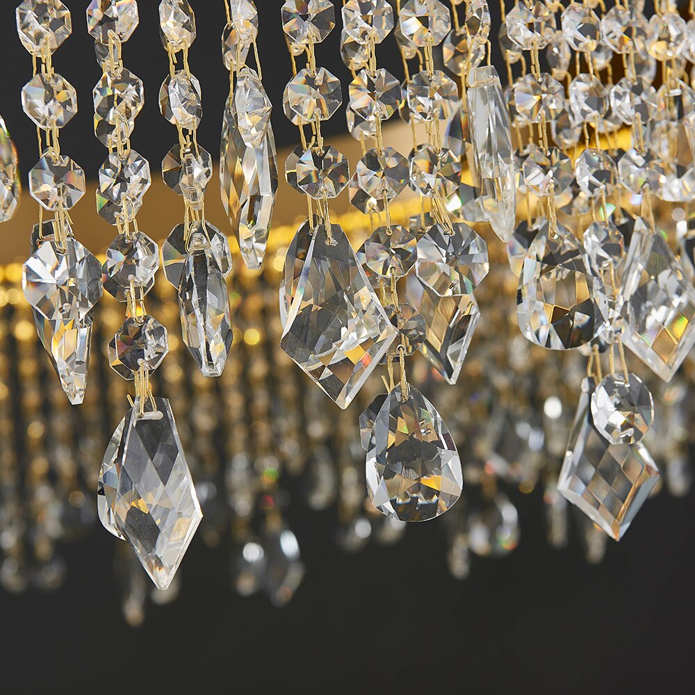 Detailed view of diamond cut octagon crystal chains on VORELLI® Modesto oval chandelier