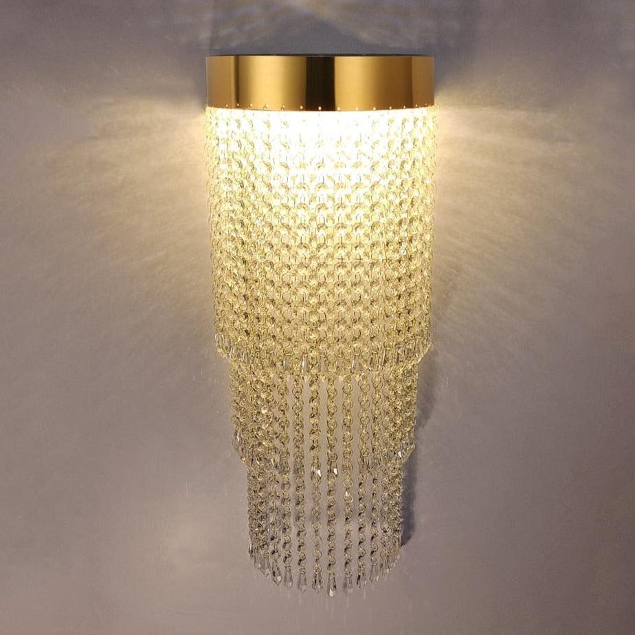 VORELLI® Modesto luxury wall light installed in contemporary living space with cascading crystal detailing