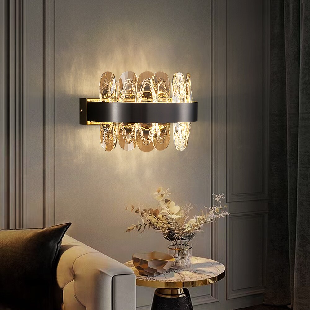 VORELLI® Monte-Carlo modern crystal wall sconce creating refined ambient lighting in elegant bedroom interior