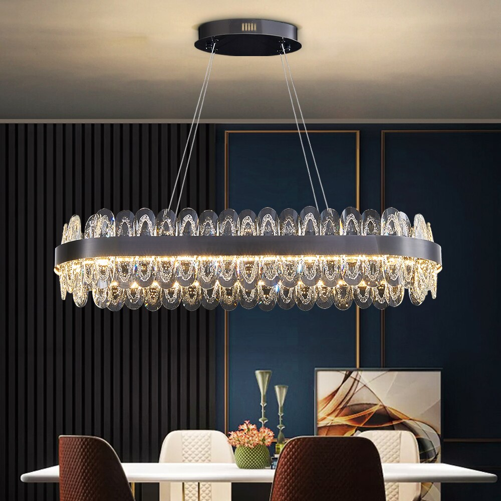 VORELLI® Monte-Carlo rectangular crystal chandelier suspended above dining table creating refined ambient lighting