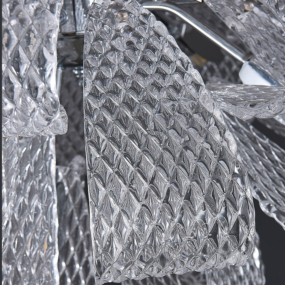 Close up of VORELLI® Munz circular chandelier highlighting sculptural textured glass ribbons and layered structure