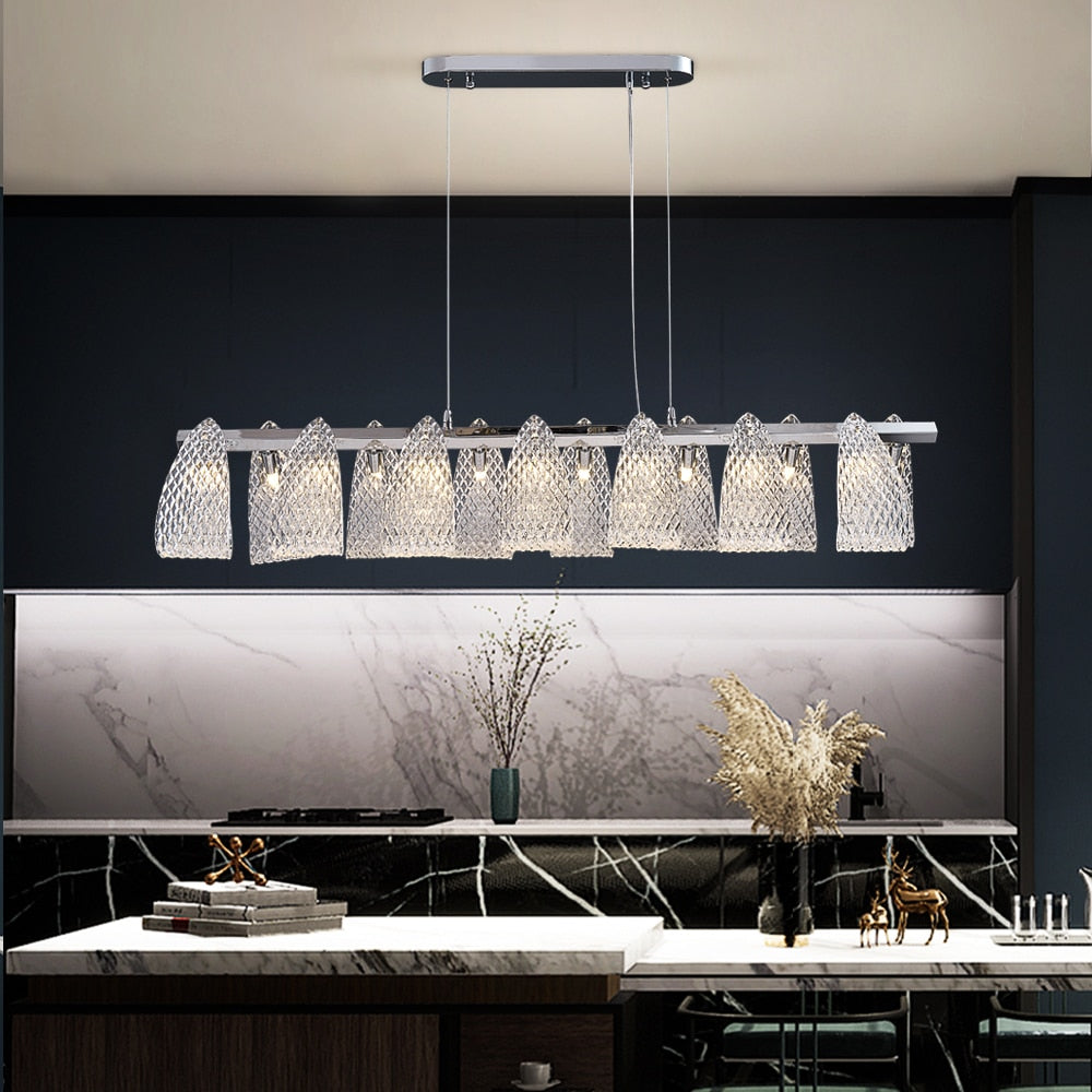 VORELLI® Munz rectangular glass chandelier suspended above dining table creating artistic ambient lighting
