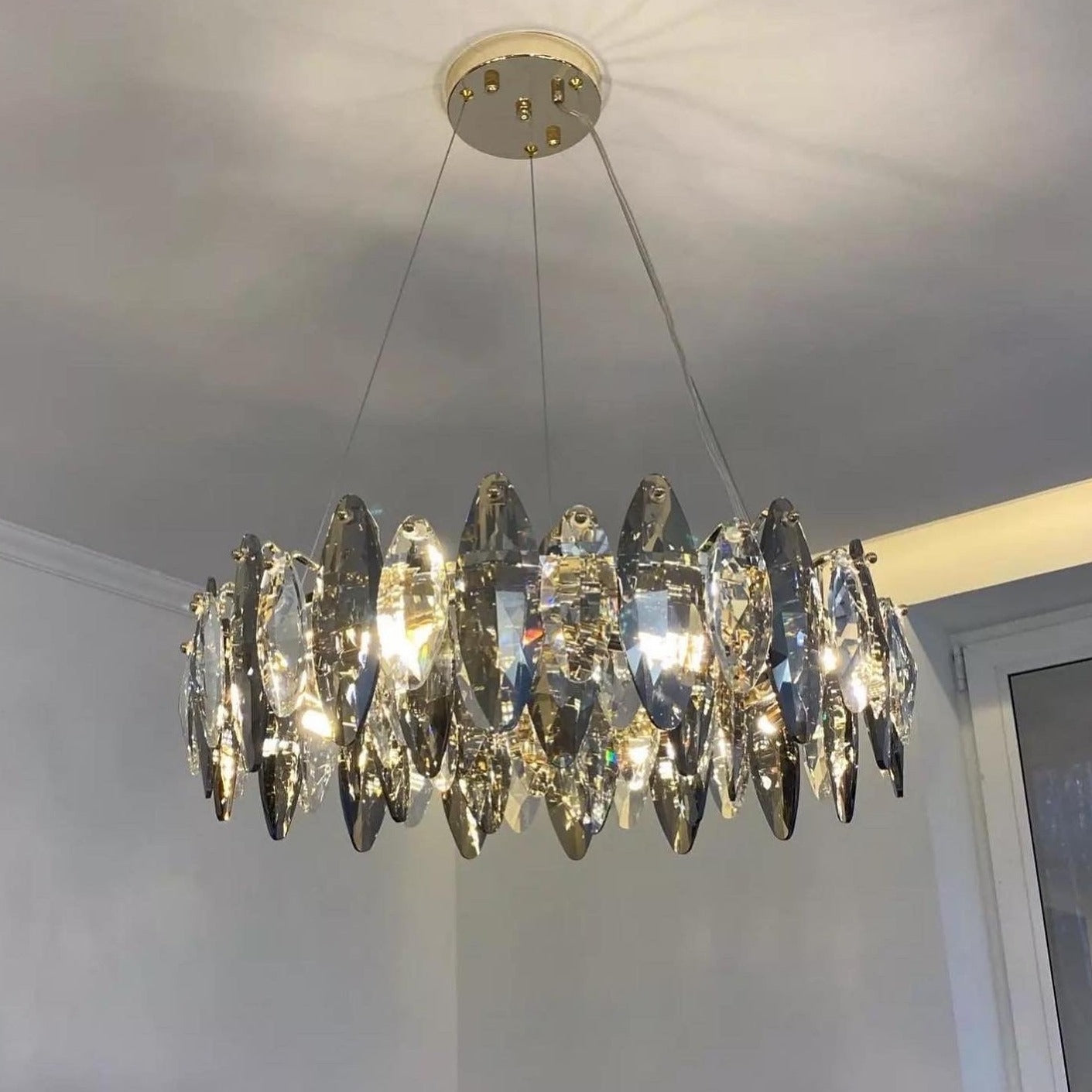 VORELLI® Oakhill round crystal chandelier suspended from ceiling creating elegant focal lighting