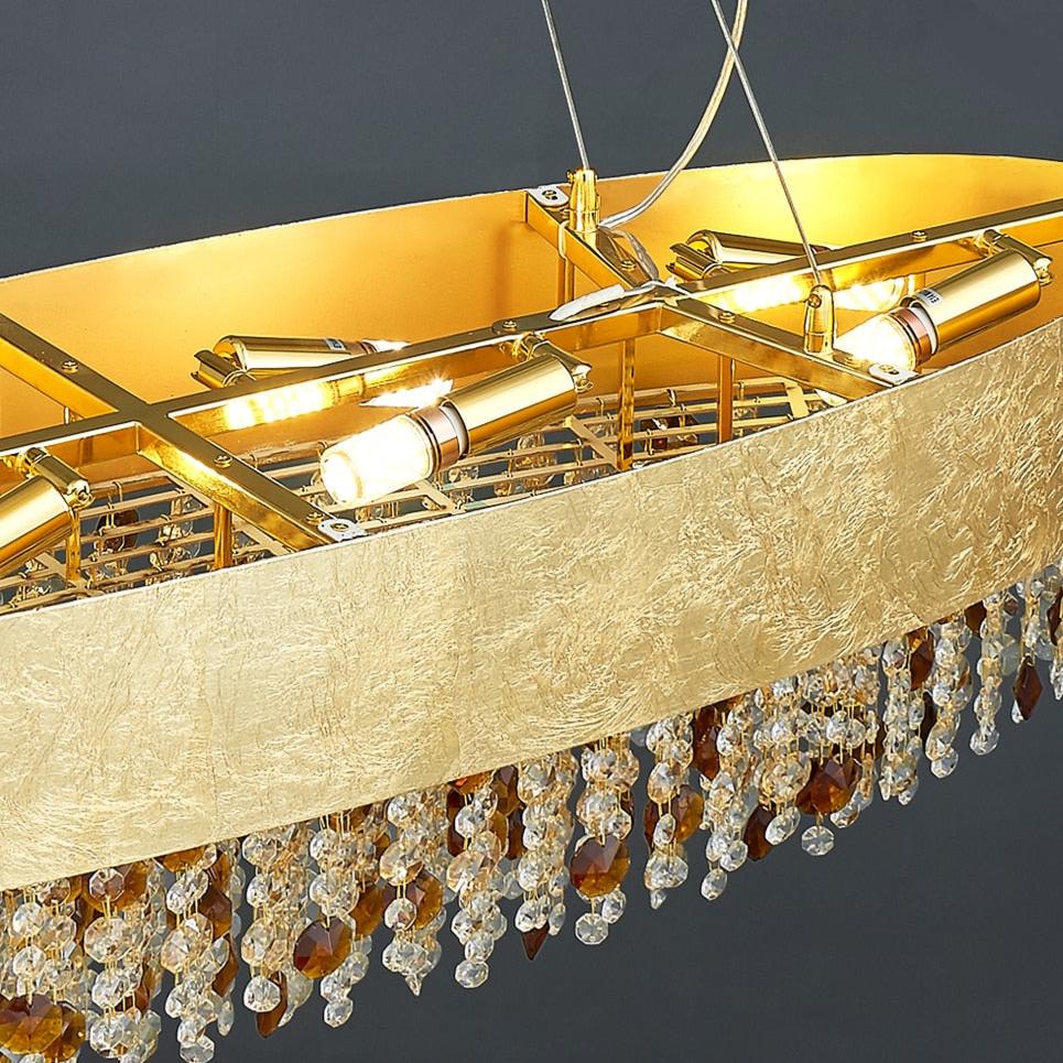 Close up of decorative textured oval frame on VORELLI® Owensboro rectangular chandelier