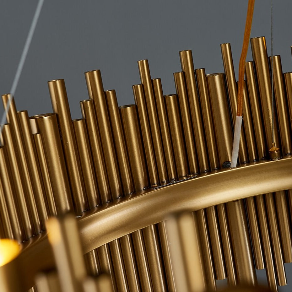 Close-up of cylindrical tube elements on rectangular chandelier showing refined modern design