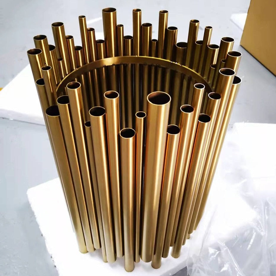 Close-up of cylindrical tube cluster on pendant light showing refined modern design