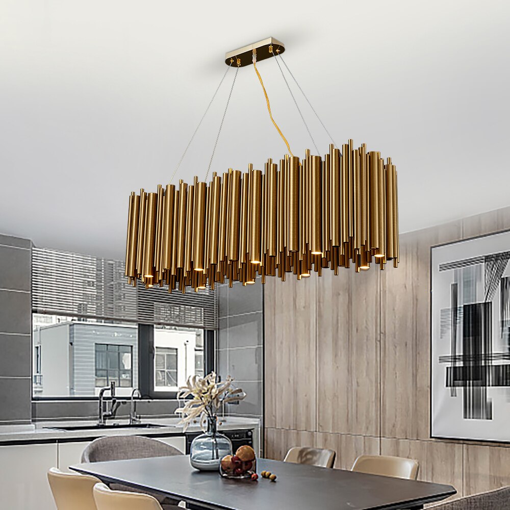 Luxury rectangular chandelier with vertical tube design over kitchen island in modern interior