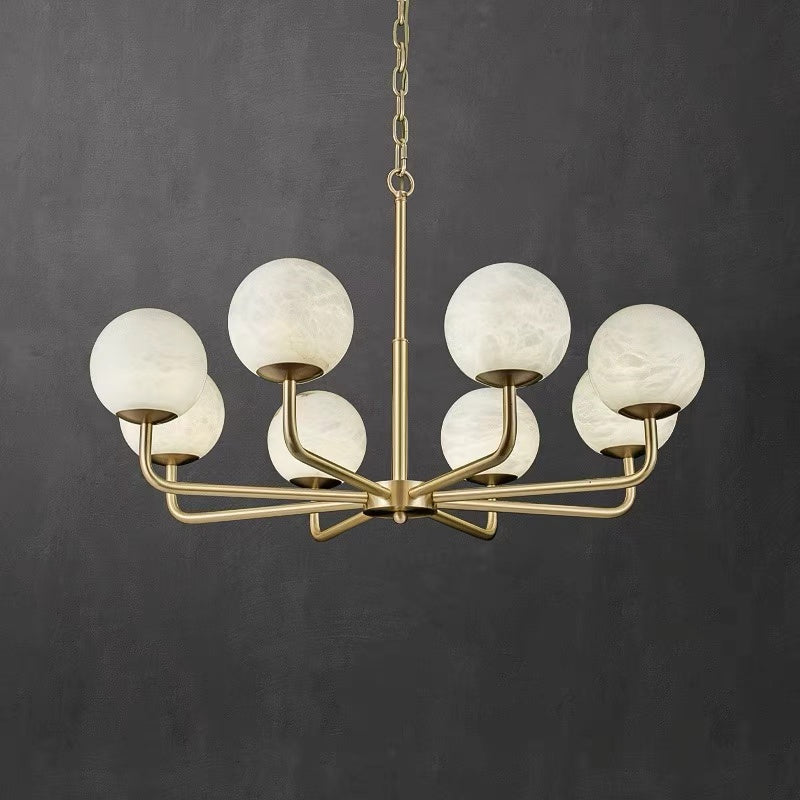 Ricco Marble Circular Chandelier with alabaster globe shades and brushed gold frame.