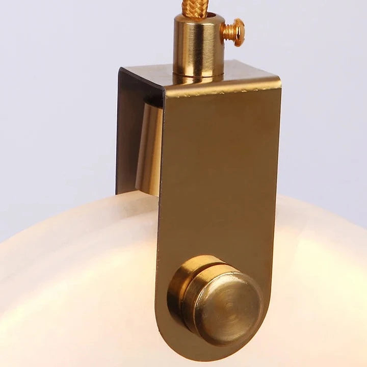 Detail shot of VORELLI® Calacatta Marble Pendant showing brushed gold fitting and premium marble craftsmanship.