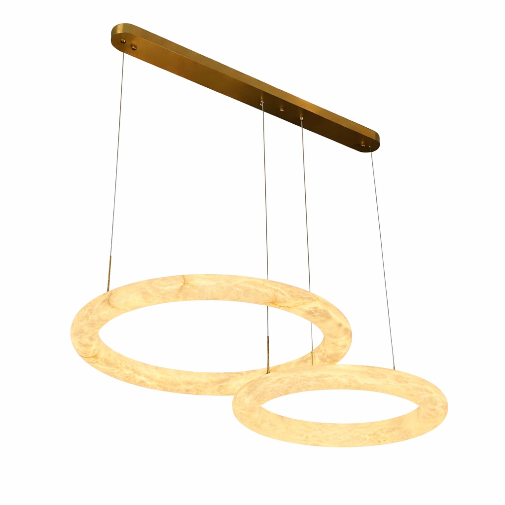 Luxury double ring marble chandelier with warm illuminated circular stone bands suspended from slim ceiling bar, modern linear hanging design against dark background