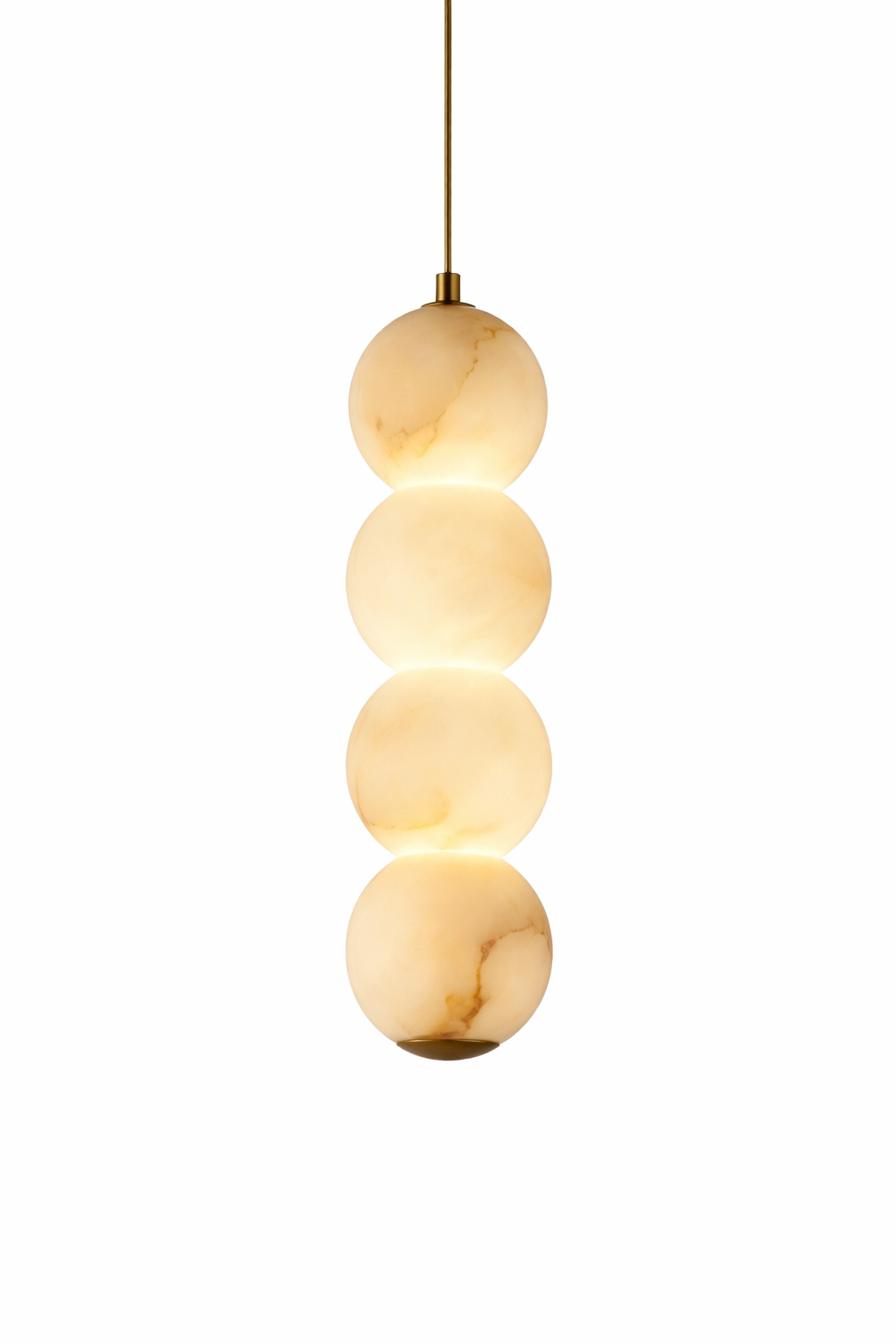 A striking view of the Thea luxury pendant light by VORELLI, creating a perfectly balanced focal point with its luminous marble spheres.