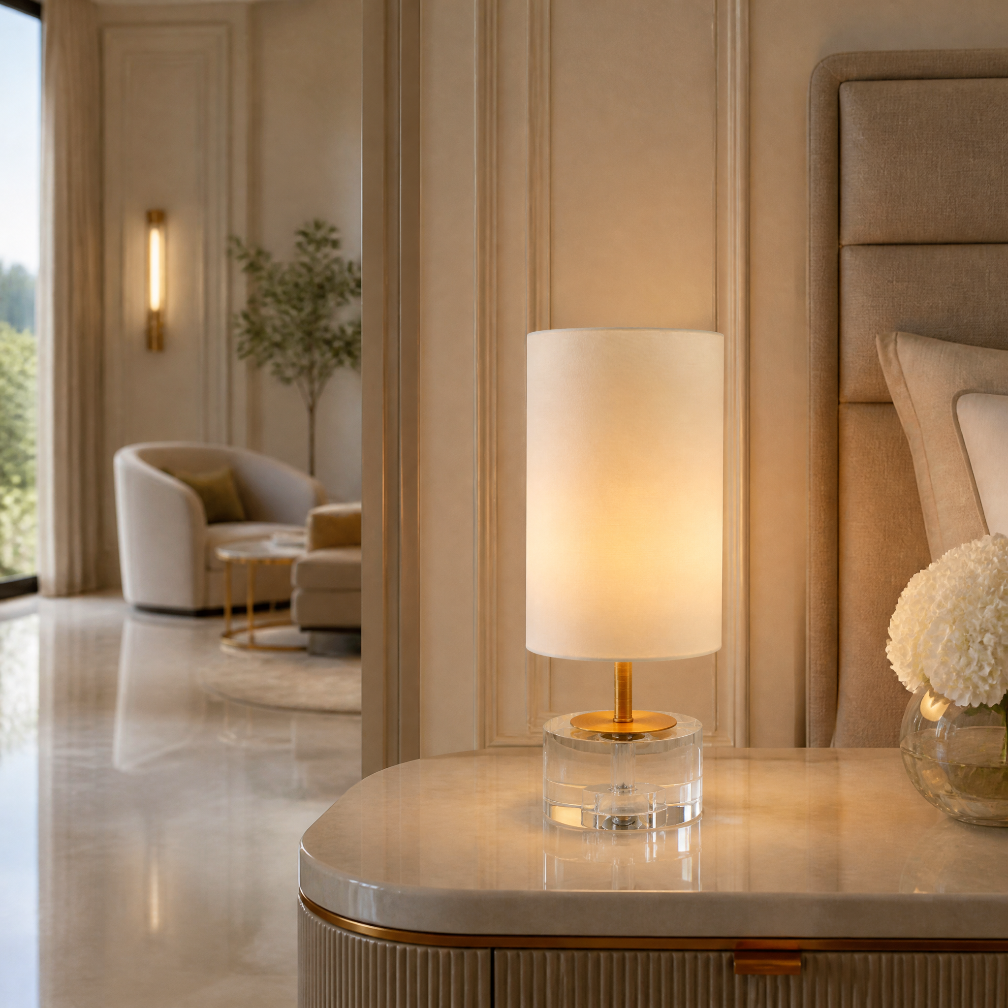 The VORELLI Alvoria Crystal Table Lamp casting a warm ambient glow on a chic bedside table in a luxury residential bedroom.