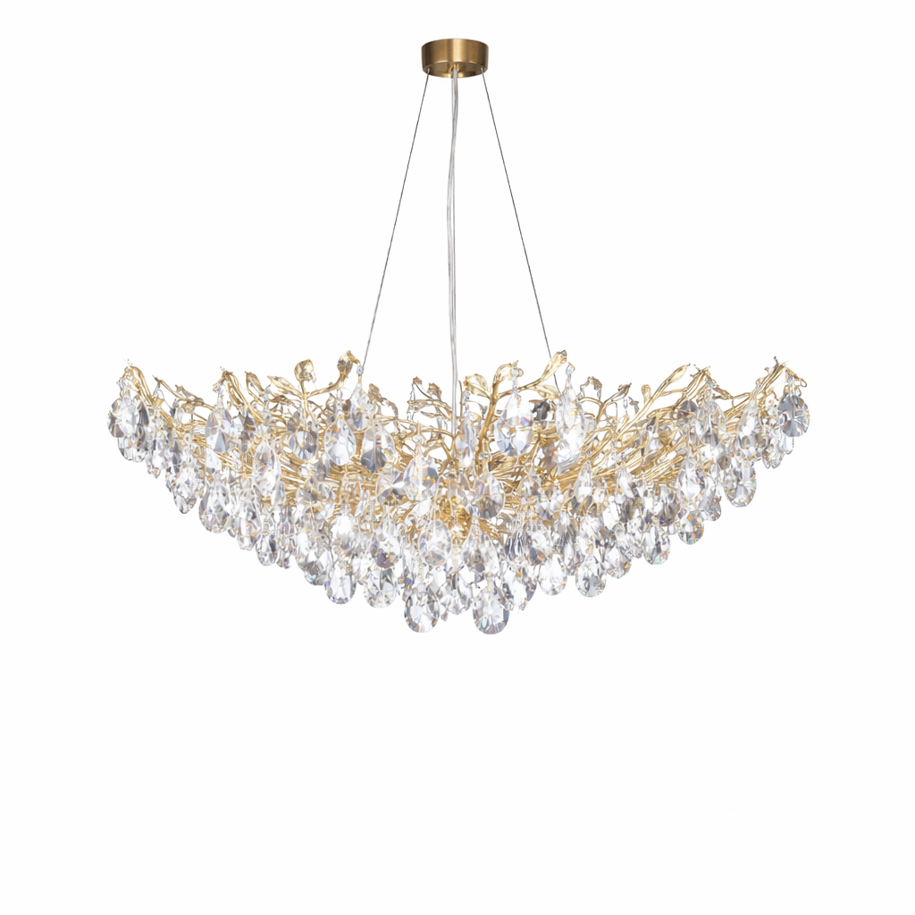 An atmospheric view of the VORELLI Dewdrop Circular Chandelier IV creating a sophisticated mood with its shimmering crystals and warm gold accents.