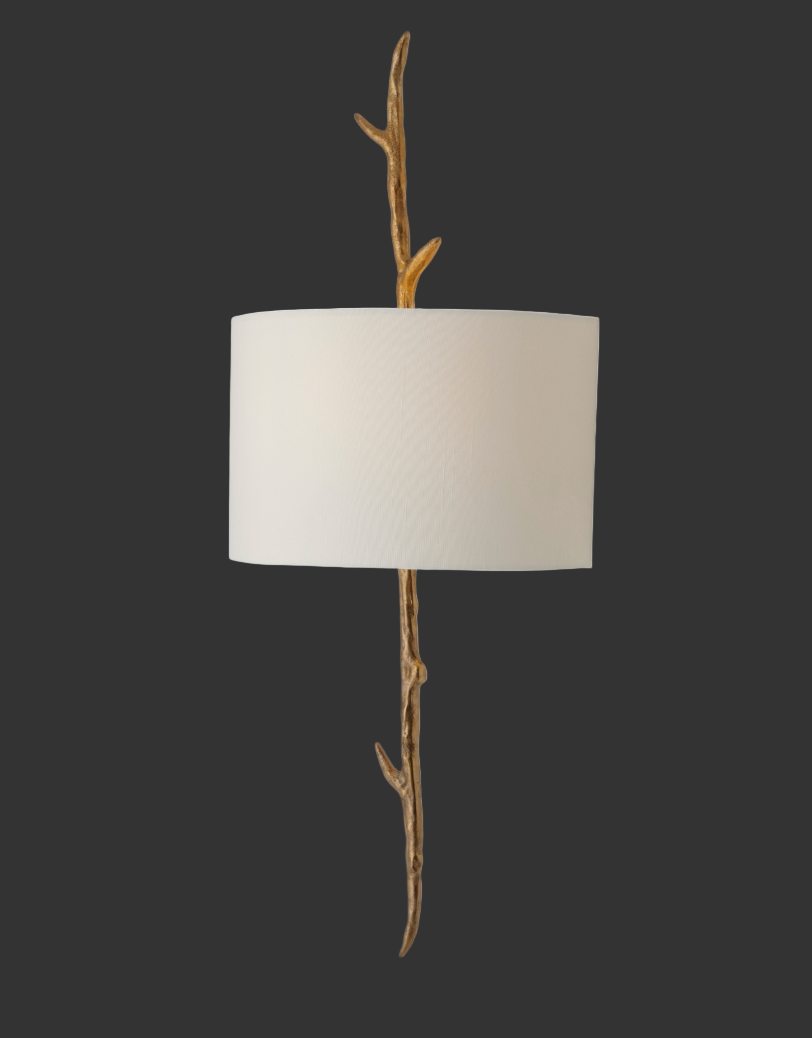 An intimate close-up shot focused on the exquisite structural details and warm, inviting ambiance created by the premium Verda Wall Light in a luxury interior.