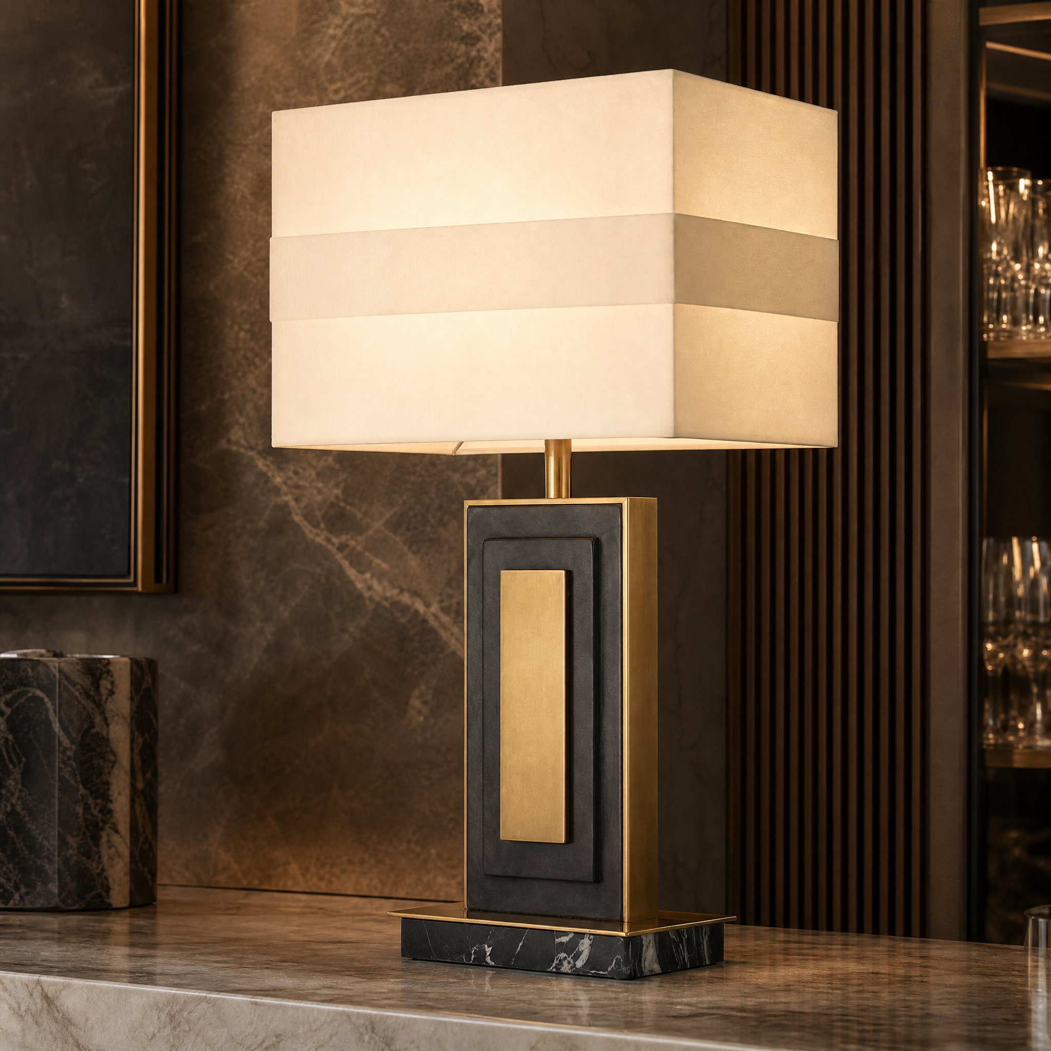Close-up detail of the Ardelle table lamp showcasing the antique brass architectural frame and solid marble base.