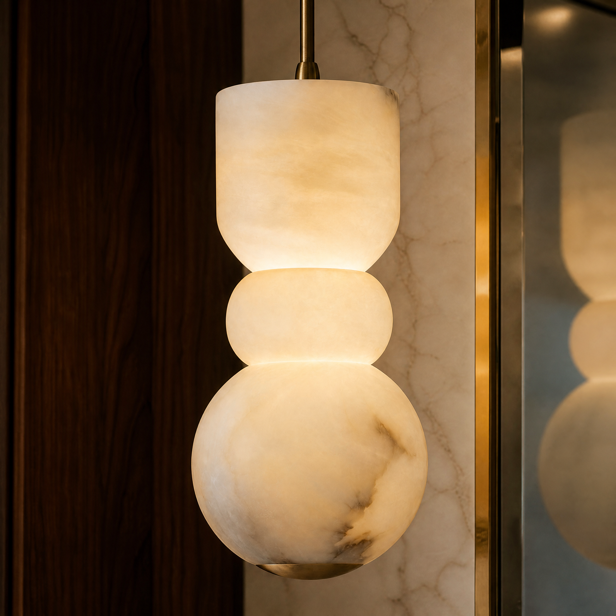 A detailed closeup showcasing the gentle curves, natural textures, and premium sculpted marble craftsmanship of the Arella Pendant Light.