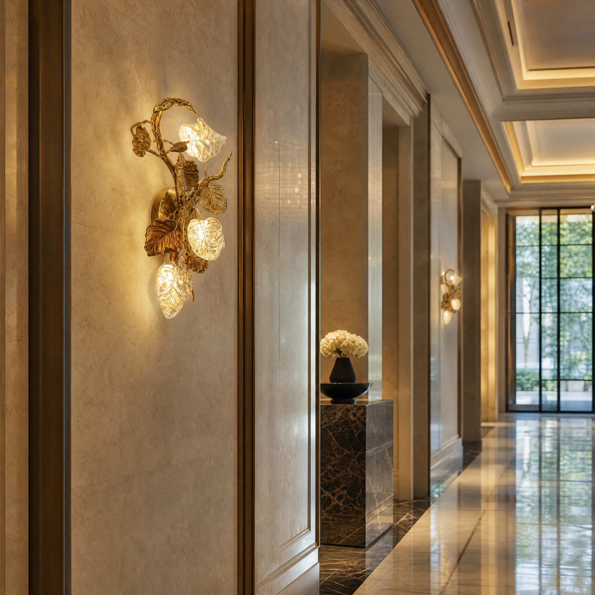 A pair of sculptural Autumn Bloom wall sconces by VORELLI flanking an upscale hotel lobby corridor, creating a sophisticated and welcoming ambiance.