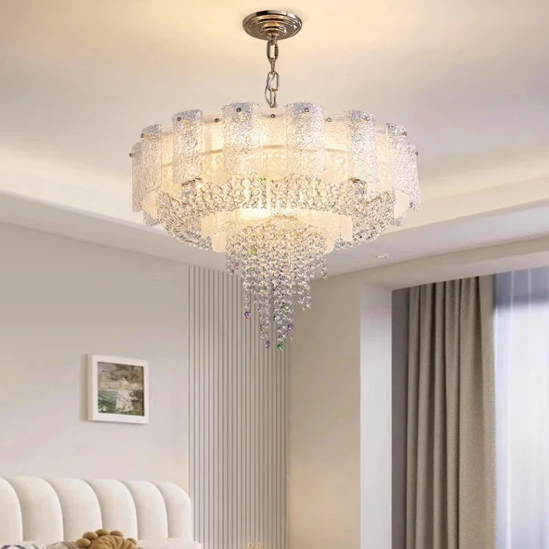 Avino Circular Chandelier installed in a refined bedroom with soft drapery and neutral tones.