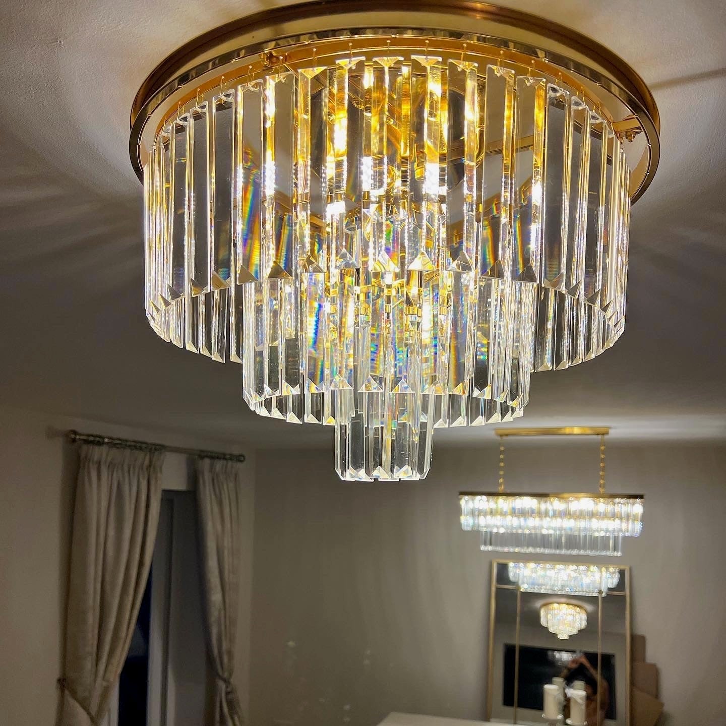 Beckenham ceiling light with tiered diamond cut crystal creating a luxury ceiling feature