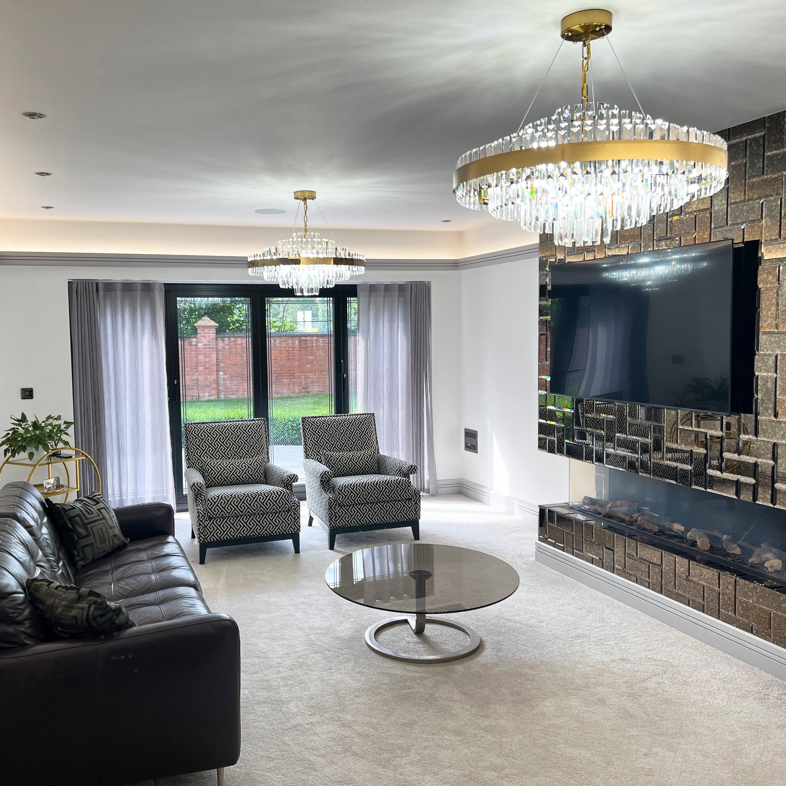 Belair circular chandelier styled in a modern luxury living space