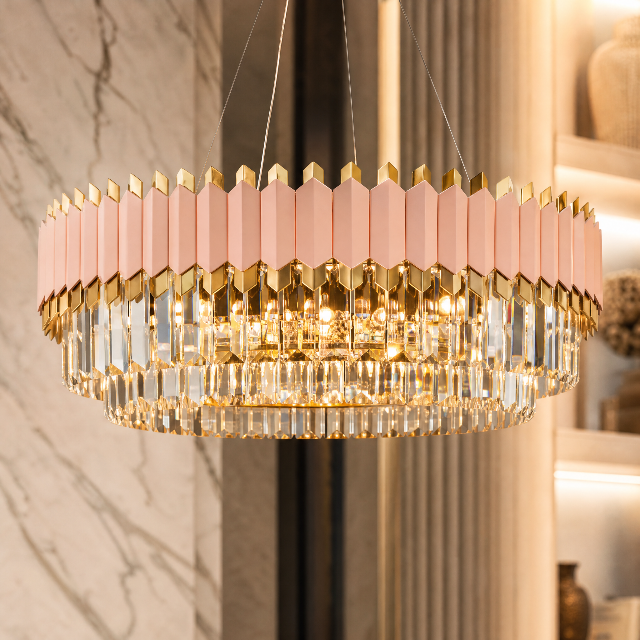 Close-up detail of the VORELLI Bianca circular chandelier showcasing the high-quality crystal bars and brushed rose gold luxury finish.