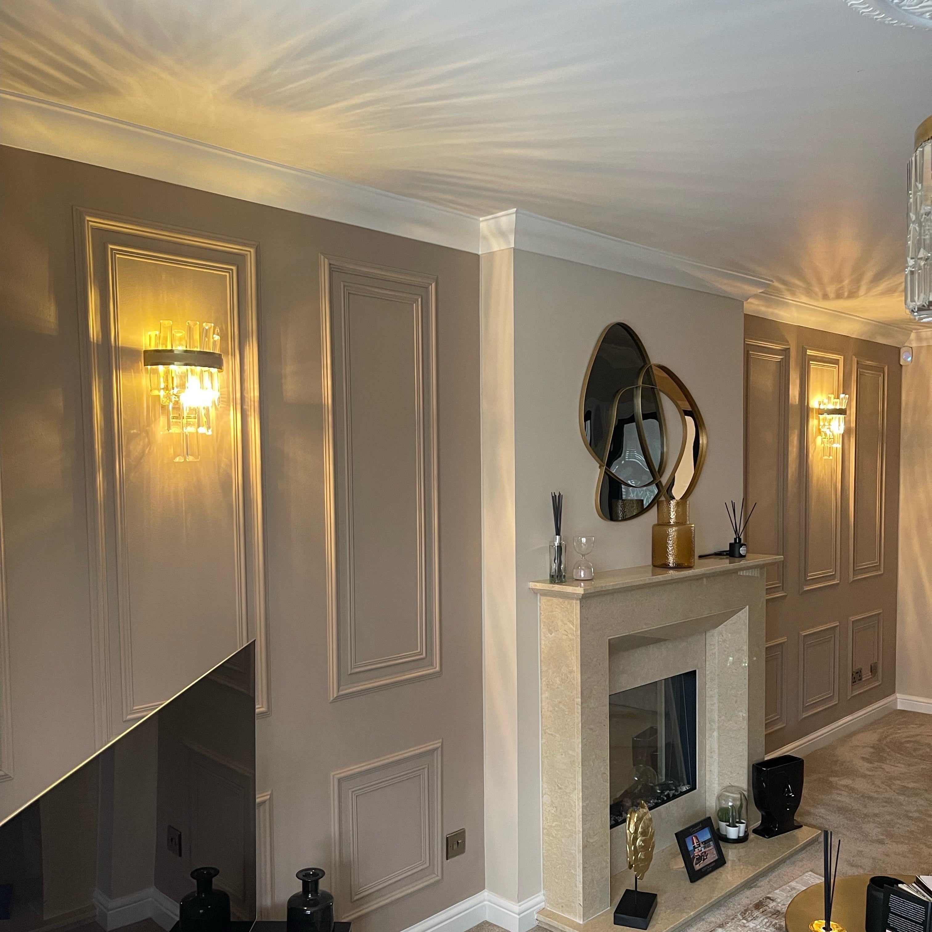 Brighouse wall light installed in a luxury living room with diamond cut crystal detailing