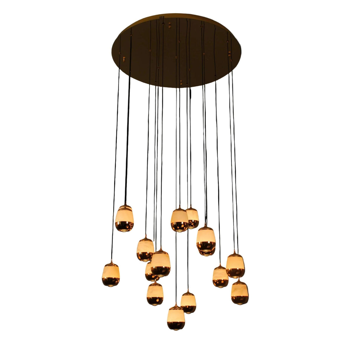 Caldera Marble Pendant Staircase Chandelier featuring cascading illuminated marble drops suspended from a circular ceiling plate.
