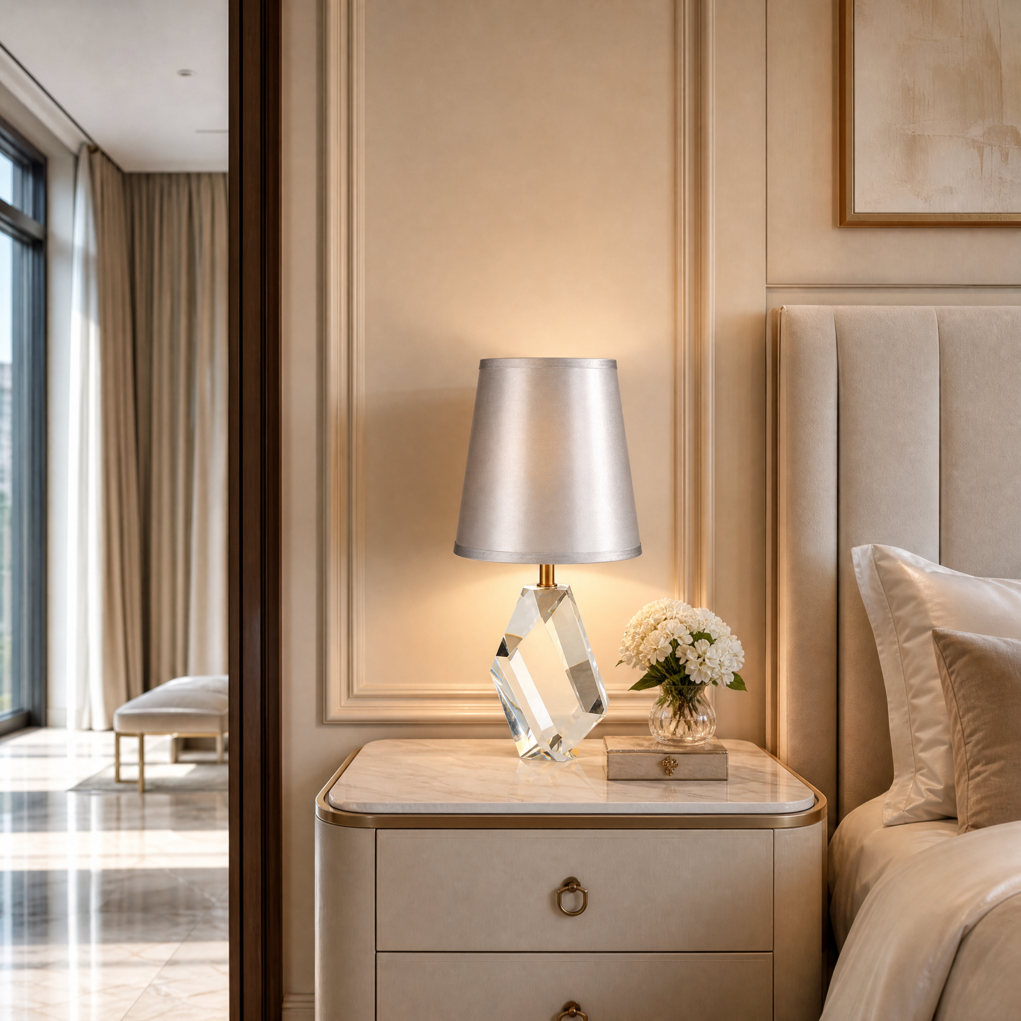 Caldria Crystal Table Lamp with antique brass accents displayed on a side table in a modern luxury living room