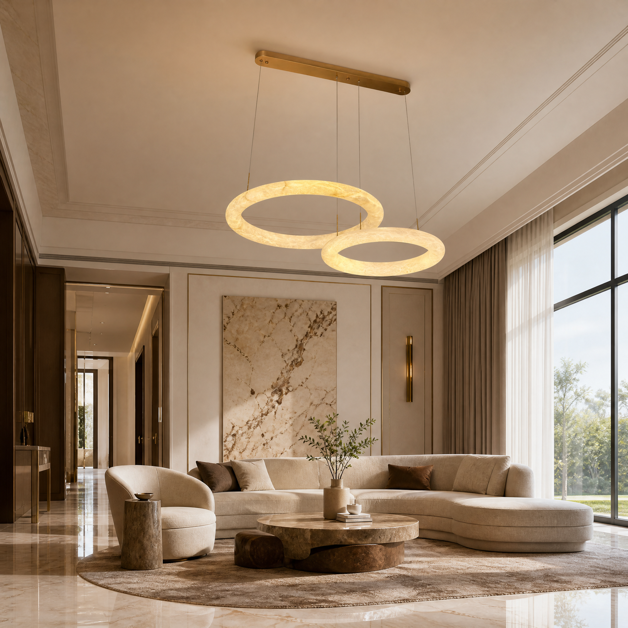 VORELLI Cavani Marble Double Ring Chandelier casting a soft, warm glow over a contemporary residential dining room table setting.