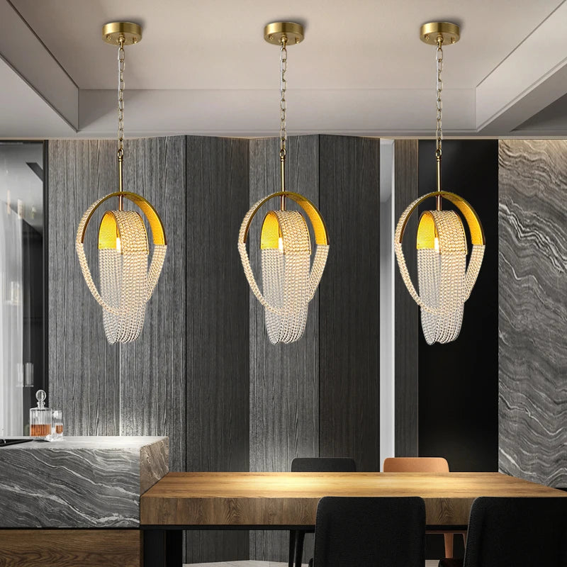 cindi pendant close view showcasing crystal octagon chain and gold frame