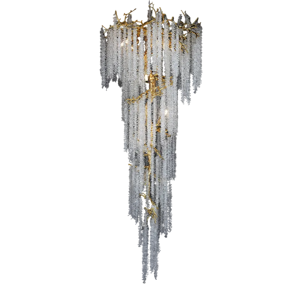 Close-up of the Vorelli Wisteria Spiral Staircase Chandelier, highlighting the intricate branch-inspired detailing interwoven with cascading crystal strands.