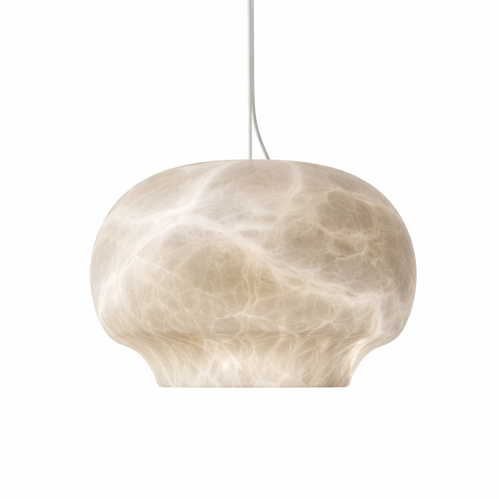 Close-up view of the Elba Marble Pendant Light by VORELLI, showcasing its delicate, translucent marble texture that radiates a calming, diffused natural glow.