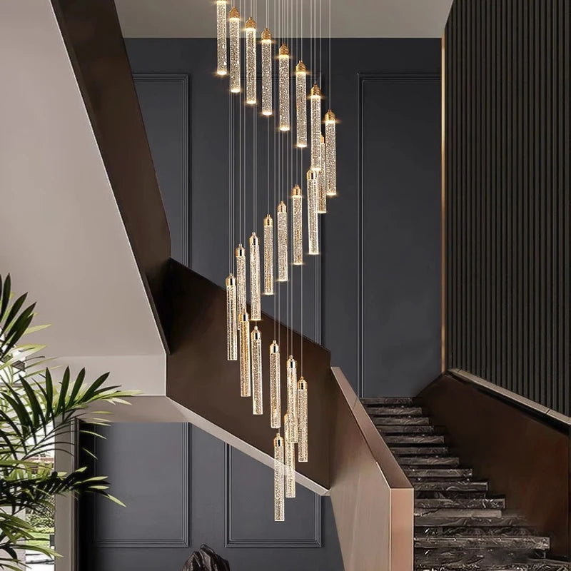 cobham pendant chandelier displayed along modern staircase with cascading lights