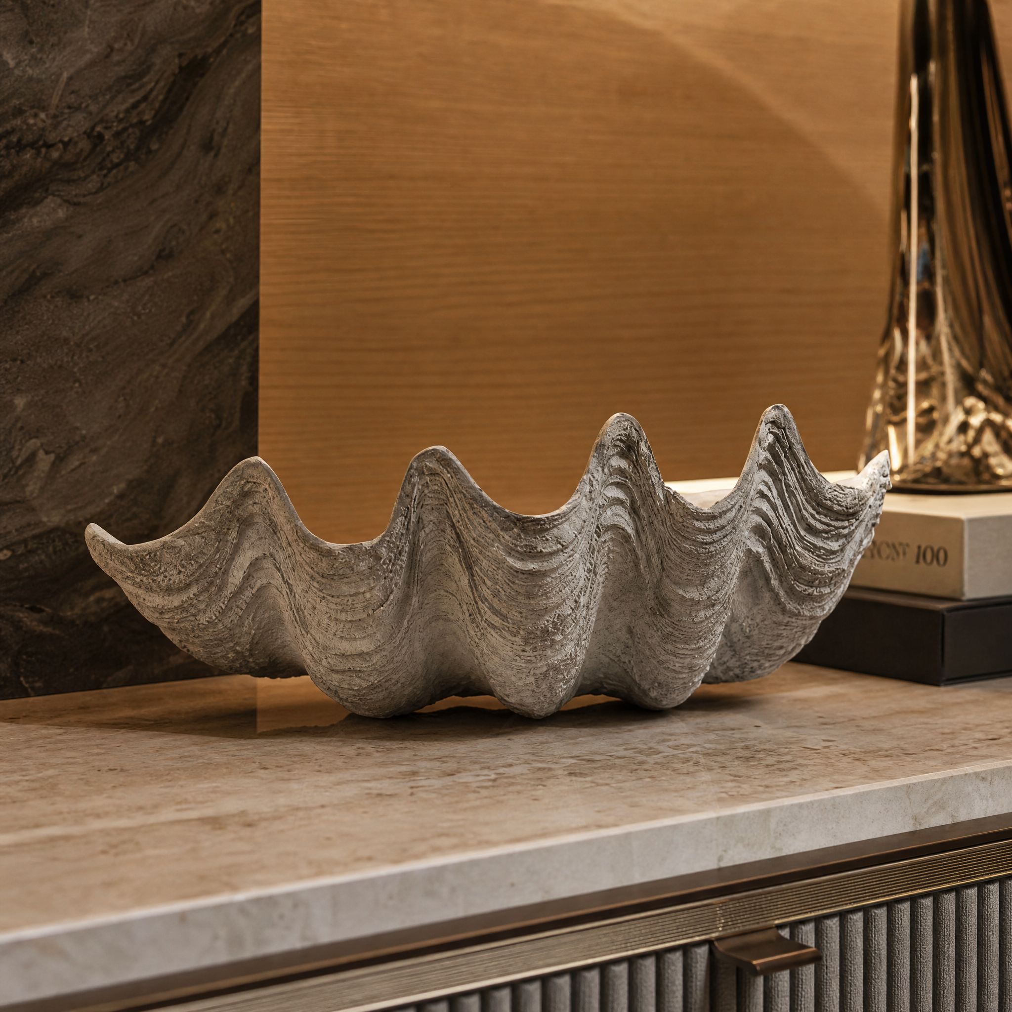 Detailed close-up shot capturing the intricate natural ridges and organic form of the Conchiglio small shell decor.
