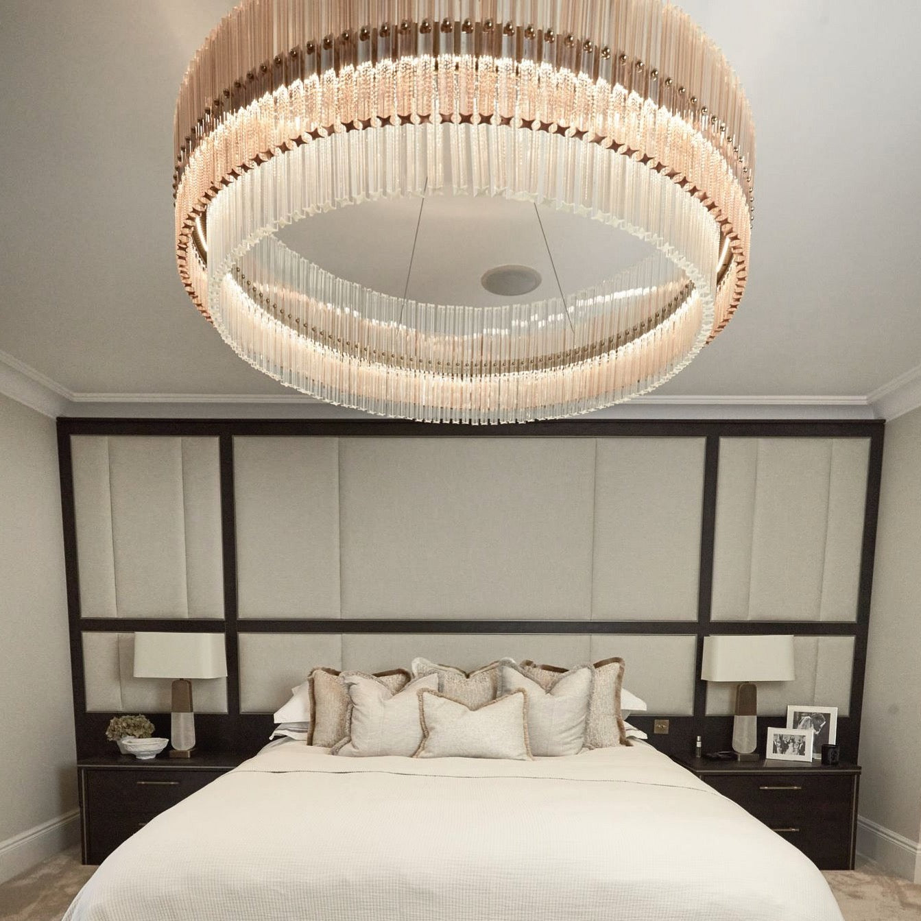 close up bedroom installation of condotti circular chandelier showing crystal ring detail