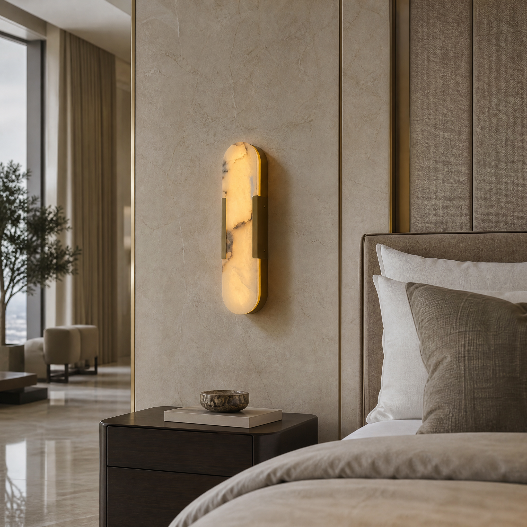 The VORELLI Dakota Marble Wall Light illuminating a sophisticated residential living room interior with a warm, elegant glow.