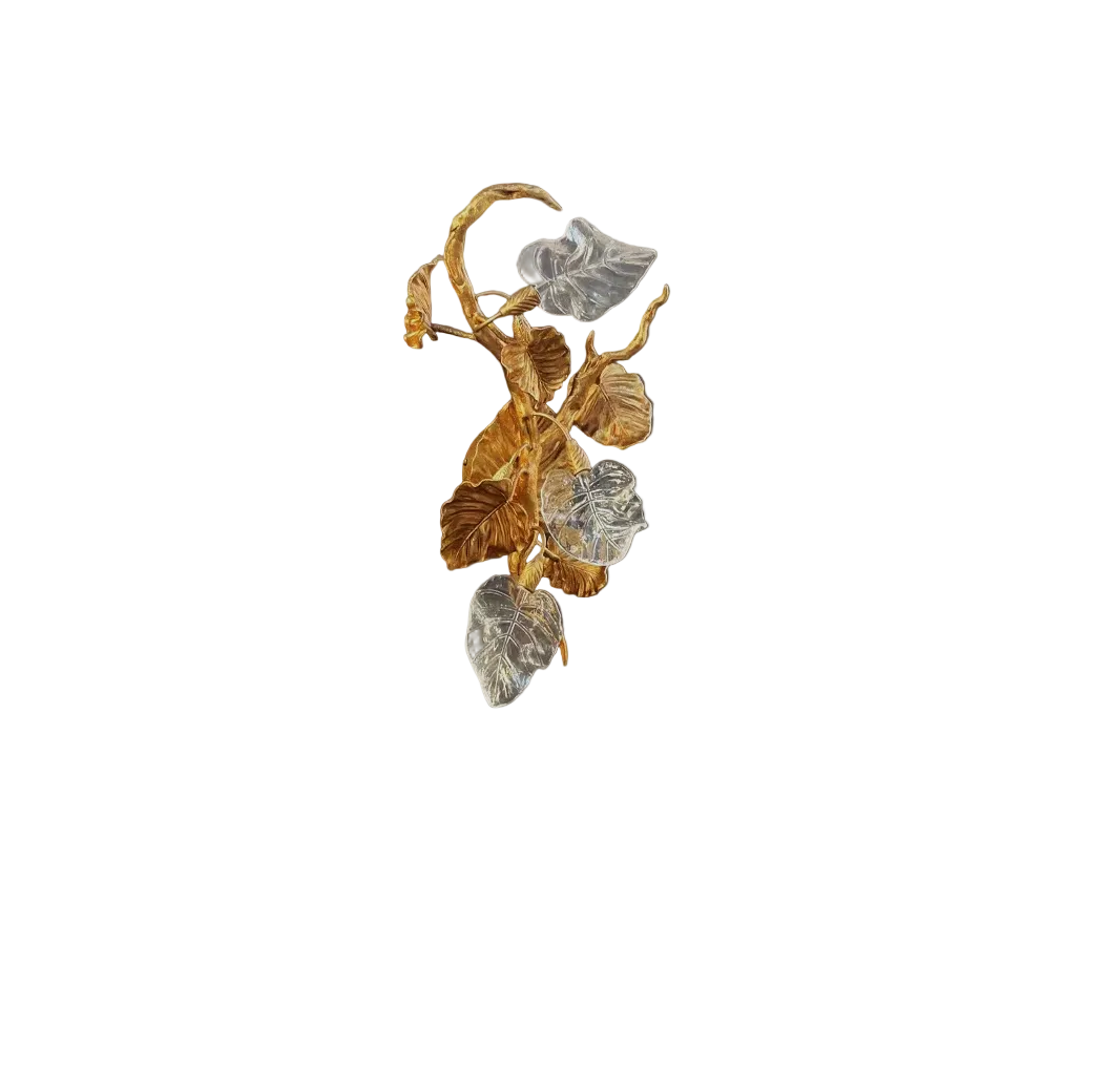 Detailed close-up of the Autumn Bloom wall light's hand-crafted metallic leaves, highlighting the rich textures and elegant depth of the luxury fixture.
