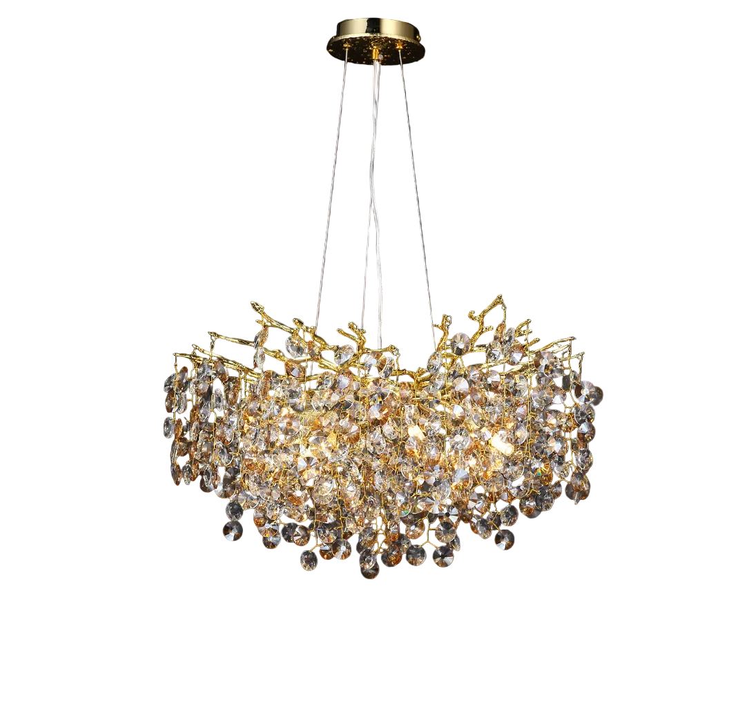 Detailed closeup of the VORELLI Mimosa Circular Chandelier, showcasing the delicate brass branching forms and shimmering crystal elements that create a warm, luxury glow.