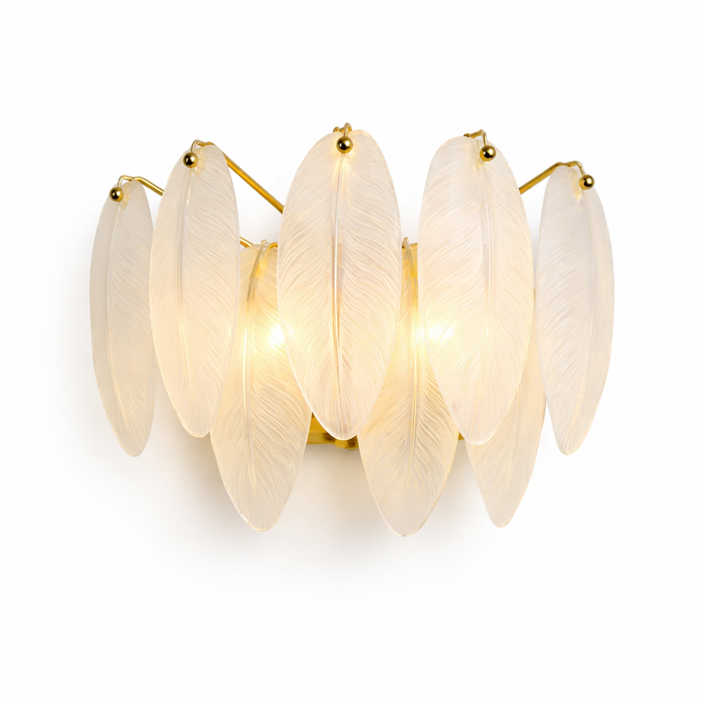 Detailed closeup of the VORELLI Piuma Wall Light showing the intricate, textured feather crystal design and its soft, luxurious glow.