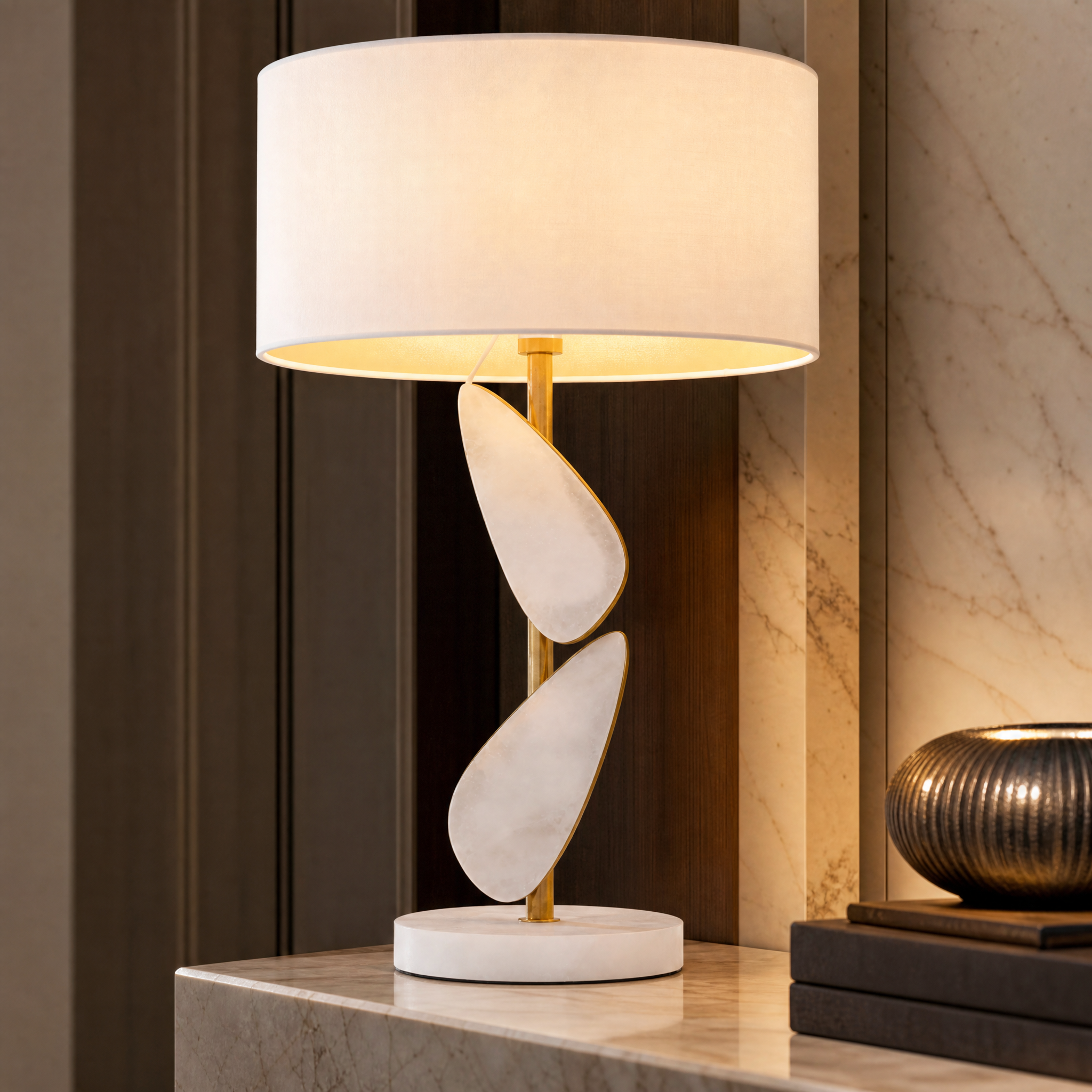 Detailed shot highlighting the rich texture of the structured fabric shade and antique brass detailing of the Alenya lamp.