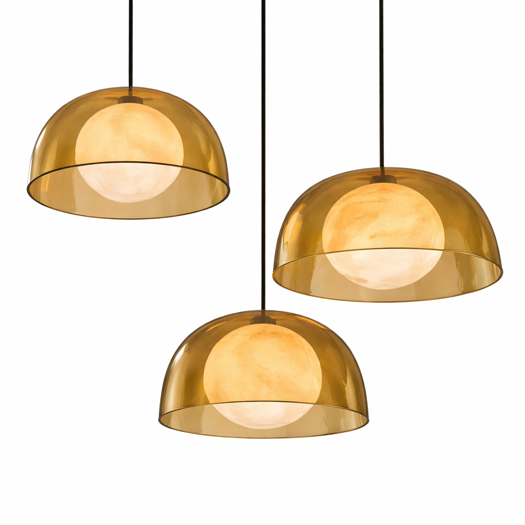 Detailed view of the VORELLI Onyx Marble Pendant Light, emphasizing the rich textures of the amber glass and the sophisticated, moody ambiance created by its warm, golden illumination.