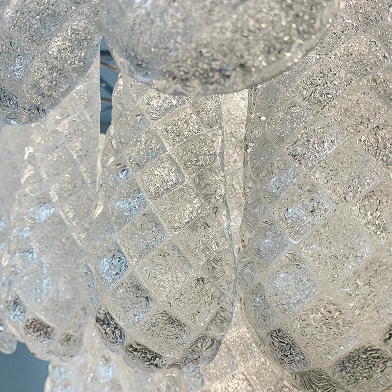 Detailed view of textured diamond cut teardrop crystals used in the Eclissi Grandeur chandelier by VORELLI®